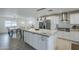 Kitchen featuring stainless steel appliances, a large island, and bright lighting at 10844 N 37Th St, Phoenix, AZ 85028
