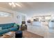 Open-concept living room with a view into the kitchen and dining area, perfect for entertaining at 10844 N 37Th St, Phoenix, AZ 85028