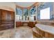 Lavish bathroom with a large tub and vanity area with ample cabinet space at 11141 E North Ln, Scottsdale, AZ 85259