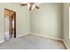 Empty bedroom featuring carpeted floors and a ceiling fan at 11141 E North Ln, Scottsdale, AZ 85259