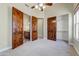 This bedroom features wooden doors, and the room is filled with natural light at 11141 E North Ln, Scottsdale, AZ 85259