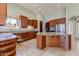 Bright, spacious kitchen with granite countertops, stainless steel appliances, and ample cabinet space at 11141 E North Ln, Scottsdale, AZ 85259