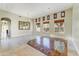 Spacious living room with travertine tile and neutral colored walls at 11141 E North Ln, Scottsdale, AZ 85259