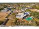 Desert home featuring solar panels, an outdoor pool, and mature landscaping at 11823 N 76Th Way, Scottsdale, AZ 85260