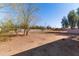 Large backyard area with mature trees and plenty of space for gardening, relaxing, and recreation at 11823 N 76Th Way, Scottsdale, AZ 85260