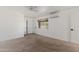 Bedroom with neutral colored walls, carpet, and window views at 11823 N 76Th Way, Scottsdale, AZ 85260