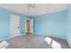 Spacious bedroom with carpet, ceiling fan, and closet at 11823 N 76Th Way, Scottsdale, AZ 85260
