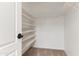 Walk-in closet with multiple shelves and carpeted flooring at 11823 N 76Th Way, Scottsdale, AZ 85260