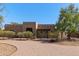 Charming home with unique architectural details and mature landscaping at 11823 N 76Th Way, Scottsdale, AZ 85260