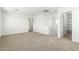 Large bonus room with neutral carpet, white walls, and ample space at 12373 W Marguerite Ave, Avondale, AZ 85323