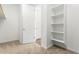 Walk-in closet with built in shelves at 12373 W Marguerite Ave, Avondale, AZ 85323