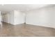 Spacious and bright living room area with tile flooring and neutral paint at 12373 W Marguerite Ave, Avondale, AZ 85323