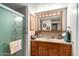 Bathroom with a vanity, medicine cabinet, and glass-enclosed shower at 1779 S 74Th St, Mesa, AZ 85209