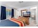 Comfortable bedroom with a dresser and a view of the bathroom at 1779 S 74Th St, Mesa, AZ 85209