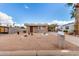 Charming single-story home featuring a quaint front yard, mature cactus, and covered parking at 1779 S 74Th St, Mesa, AZ 85209