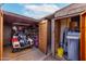 Garage and water softener and features an open garage with a golf cart at 1779 S 74Th St, Mesa, AZ 85209
