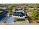 Aerial view of the property displaying landscaping, a paved drive, and charming neighborhood setting at 2202 E Osborn Rd, Phoenix, AZ 85016