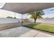 Large backyard with shade structure, gravel landscaping, and a small grass patch at 2202 E Osborn Rd, Phoenix, AZ 85016