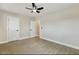 Bedroom featuring new wood-look flooring, neutral walls, a ceiling fan, and closet at 2202 E Osborn Rd, Phoenix, AZ 85016