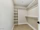 Walk-in closet with custom shelving for optimized storage and organization at 2202 E Osborn Rd, Phoenix, AZ 85016