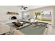 Spacious game room with a pool table, fireplace, and sliding glass doors to the backyard at 2202 E Osborn Rd, Phoenix, AZ 85016