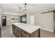 Spacious kitchen island, dark cabinets, white countertop and modern pendant lighting at 2202 E Osborn Rd, Phoenix, AZ 85016