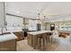 Modern kitchen with white cabinets, stainless steel appliances, and a large island with seating at 2202 E Osborn Rd, Phoenix, AZ 85016