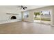Bright living room with fireplace, sliding doors to the backyard, and hardwood floors at 2202 E Osborn Rd, Phoenix, AZ 85016