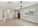 Bright living room with ample natural light, hardwood floors, and a view of the front yard at 2202 E Osborn Rd, Phoenix, AZ 85016