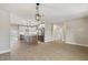 Spacious living room showcasing an open floor plan and modern kitchen with stainless appliances at 2202 E Osborn Rd, Phoenix, AZ 85016