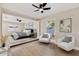 Serene main bedroom with ensuite and a cozy seating area at 2202 E Osborn Rd, Phoenix, AZ 85016