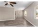 Versatile living area with modern flooring, lots of natural light, and neutral walls ready for personalization at 26235 S Lakeview Dr, Sun Lakes, AZ 85248