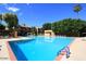 Large community pool area with plenty of seating and lounging space at 3031 N Civic Center Plz # 306, Scottsdale, AZ 85251