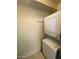 Conveniently located laundry area with stacked washer and dryer units, optimizing space and functionality at 3031 N Civic Center Plz # 306, Scottsdale, AZ 85251