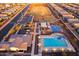 Bird's-eye view of the community center featuring a pool, basketball court, and picnic area at 37236 N Navarra Rd, San Tan Valley, AZ 85140