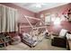 Charming bedroom designed with -friendly decor, including a house-shaped bed frame and plush toys at 37236 N Navarra Rd, San Tan Valley, AZ 85140