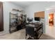 Functional home office with a desk, shelving, and ample space for productivity at 37236 N Navarra Rd, San Tan Valley, AZ 85140