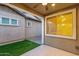 View of the back patio featuring artificial turf at 3802 E Stiles Ln, Gilbert, AZ 85295
