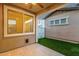 Back patio features artificial turf at 3802 E Stiles Ln, Gilbert, AZ 85295