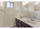 Bathroom featuring a double sink vanity with granite countertop and stylish fixtures at 3802 E Stiles Ln, Gilbert, AZ 85295