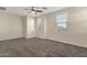 Bedroom featuring multiple windows providing ample natural light and carpet at 3802 E Stiles Ln, Gilbert, AZ 85295
