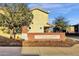 Welcoming community entrance featuring a brick sign for The Bungalows at Cooley Station at 3802 E Stiles Ln, Gilbert, AZ 85295