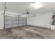 Spacious two-car garage with ample storage space and overhead door opener, ready for your vehicles and projects at 3802 E Stiles Ln, Gilbert, AZ 85295
