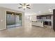 Open kitchen with granite breakfast bar, stainless appliances and seamless access to living area at 3802 E Stiles Ln, Gilbert, AZ 85295