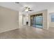 Open living room with sliding glass doors to outdoor space, ample natural light at 3802 E Stiles Ln, Gilbert, AZ 85295