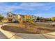 A playground with slides and climbing structures offers a fun recreation space at 3802 E Stiles Ln, Gilbert, AZ 85295