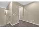 Upstairs hallway with carpeted flooring, white trim, and natural light from a window at the top of the staircase at 3802 E Stiles Ln, Gilbert, AZ 85295