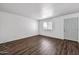 Living room with wood-look flooring, ample natural light, and neutral paint at 4307 N 21St Dr # 3, Phoenix, AZ 85015