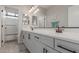 Bright bathroom vanity with double sinks, stylish fixtures, lots of light, and ample storage for essentials at 502 E Kona Dr, Casa Grande, AZ 85122