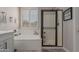 Bathroom showcases soaking tub, walk-in shower, and decorative accents at 502 E Kona Dr, Casa Grande, AZ 85122